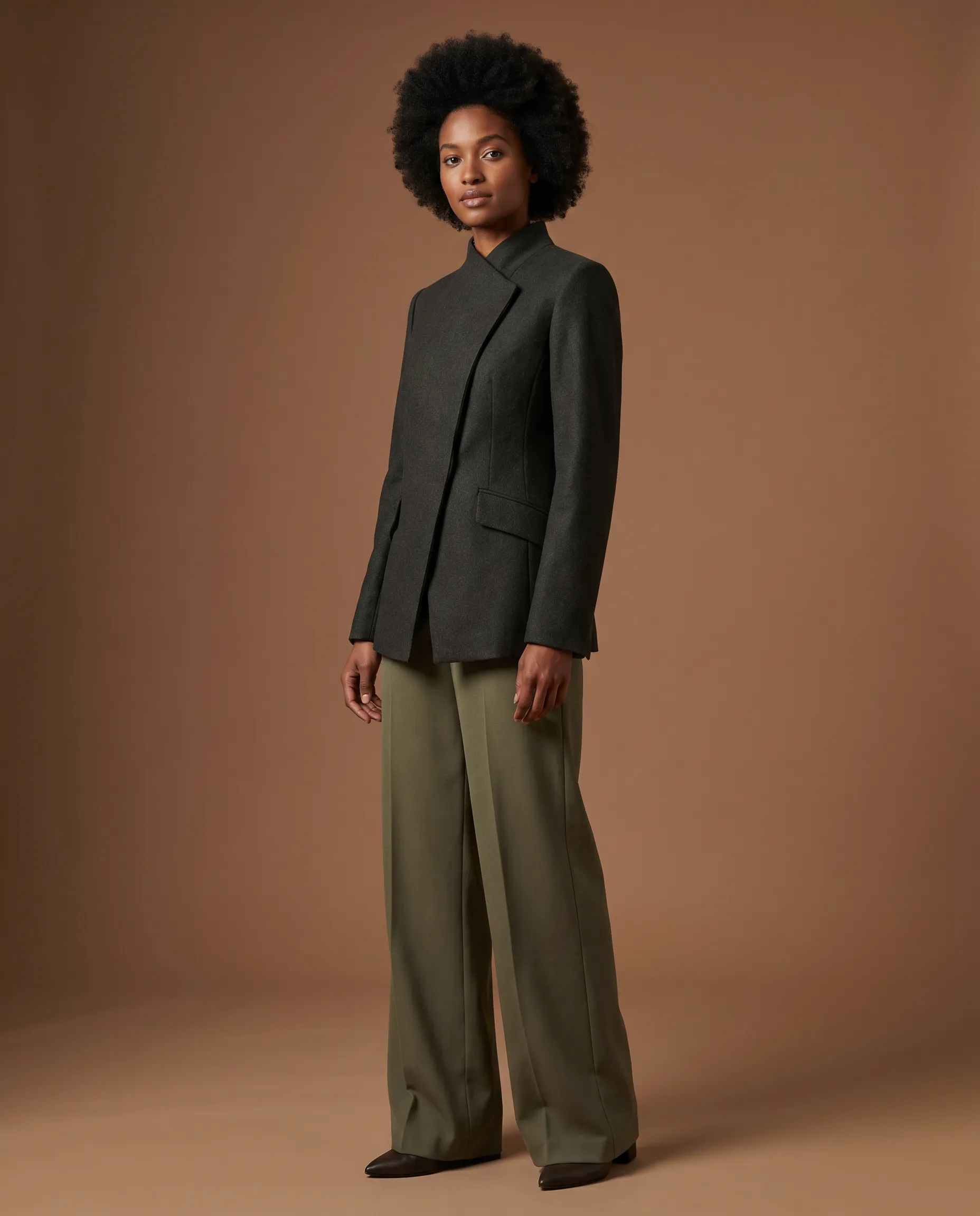 AI-generated on-model fashion photograph: a named AI model wearing a structured garment in a directed pose against a clean studio scene, demonstrating pose and scene control