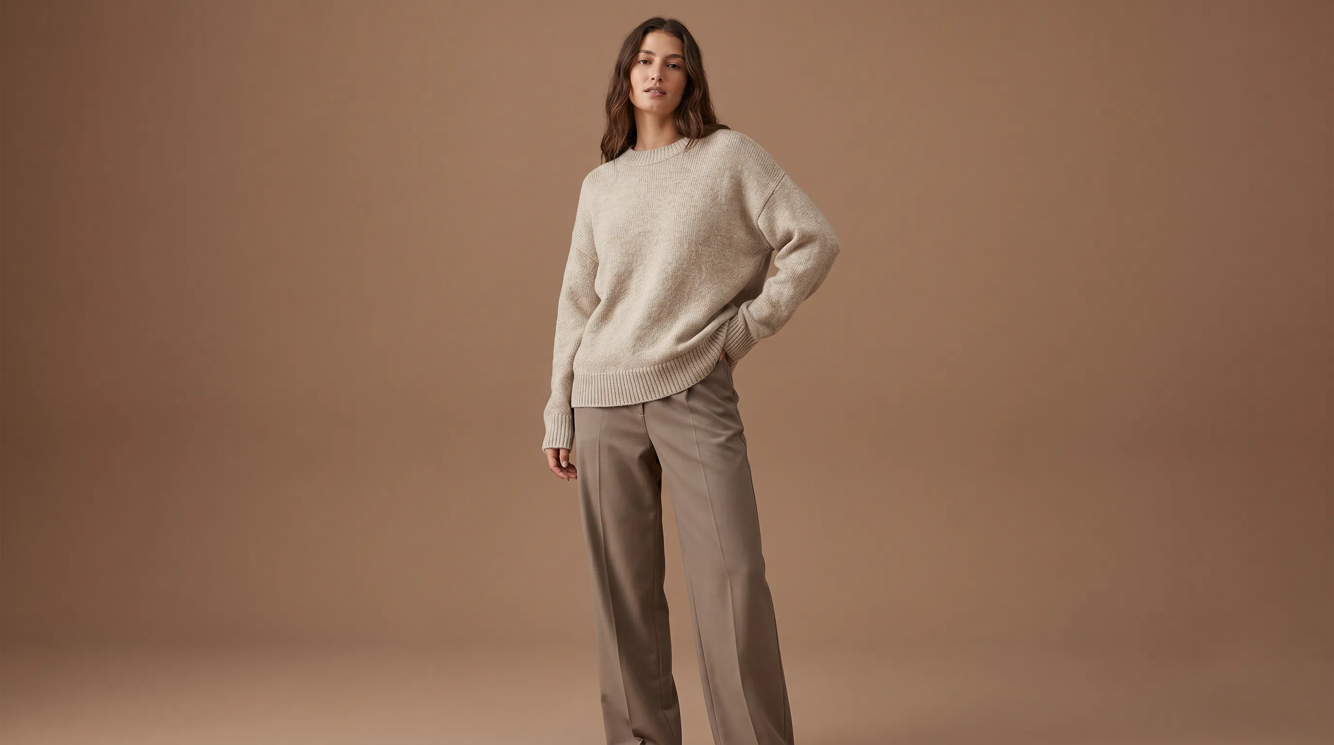 AI-generated on-model fashion image of a garment rendered on a consistent model in a studio scene, produced without a photographer